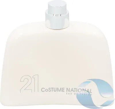 A white bottle of perfume with a silver cap.