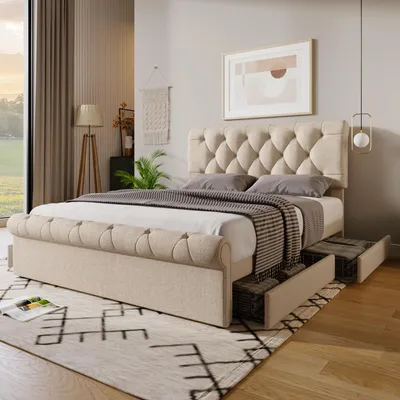 A bedroom scene featuring a tufted bed with storage drawers, a rug, and a window with curtains.
