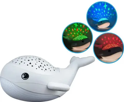 A white whale-shaped night light projector is shown on a white background. Three circular insets display the whale projecting different colored starry sky patterns.