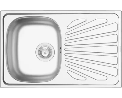 A top-down view of a stainless steel kitchen sink with a drainboard.