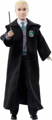 A doll representing the character Draco Malfoy from Harry Potter, wearing his school uniform and holding a wand.