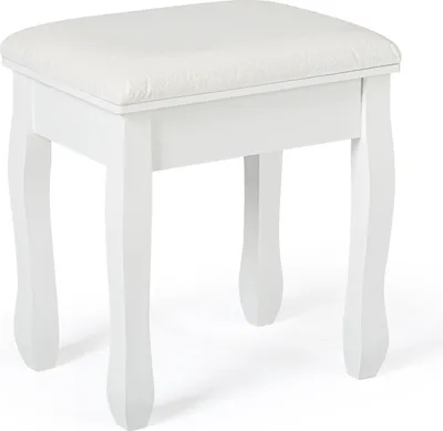 A white upholstered stool with ornate legs against a white background.