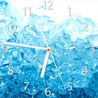 Produktbild von Wallario Design Wanduhr Leuchtendes Eis in blau aus Echtglas, Größe 20 x 20 cm