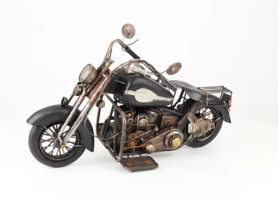 Productafbeelding van A Tin Model Of A Motorcycle