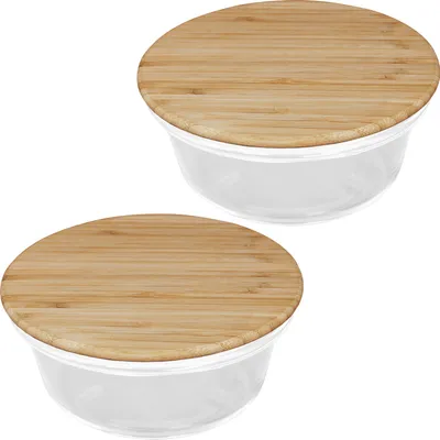 Two glass storage containers with bamboo lids are shown against a white background.
