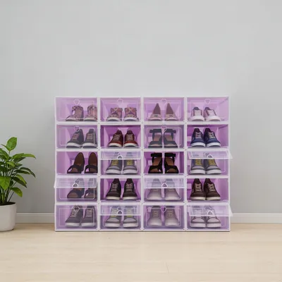 A display of shoe storage boxes filled with shoes.