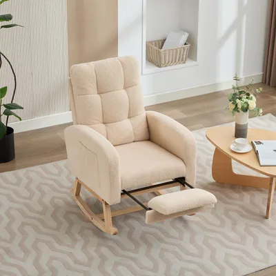 A beige rocking chair with an extended footrest is shown in a living room setting.