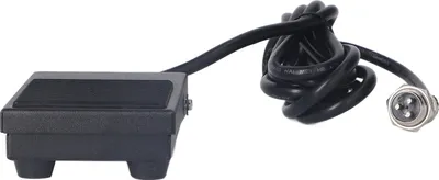 A black foot pedal switch with a coiled black cable and a silver connector is shown against a white background.