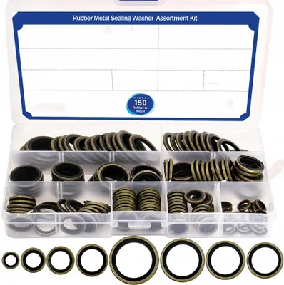 A clear, well-lit image of a plastic organizer box filled with various sizes of rubber and metal sealing washers. The box is open, showing multiple compartments containing stacks of washers. A few washers are also displayed in a row at the bottom of the im