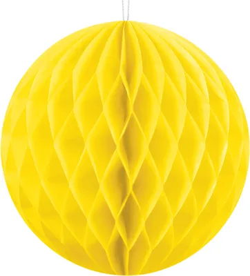 A yellow honeycomb paper ball decoration.