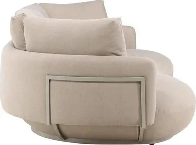 A beige sofa is shown from a side angle against a white background.