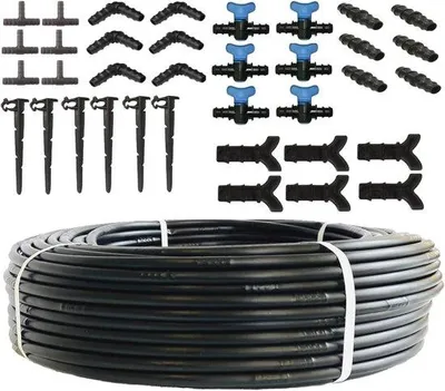 Produktbild von 100m Schlauch für Gartenbewässerung mit 36-teiligem Zubehör-Set - UV-beständig und flexibel