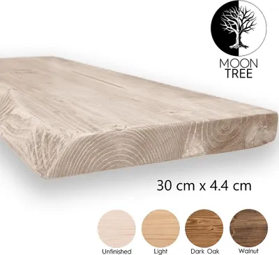 A wooden shelf with different color swatches and branding.
