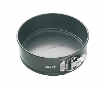 A round cake pan with a removable bottom and a clamp closure.