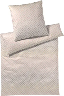 A folded duvet cover and pillowcase set with a geometric pattern.