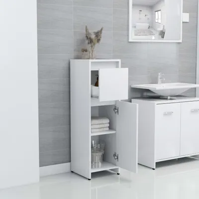A white bathroom cabinet in a modern bathroom with grey tiled walls.