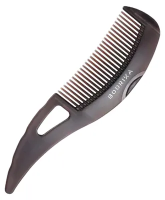 Imagen del producto de Cepillo con diseño ergonómico que elimina las escamas y la suciedad, protege el cuero cabelludo y es ideal para el cuidado del cuero cabelludo