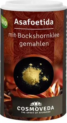 A product shot of a spice container with text and a small pile of the spice.