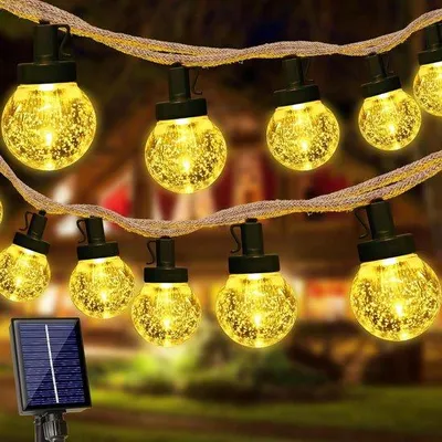 Immagine prodotto di Ghirlanda luminosa solare da esterno - Ghirlanda LED da 11 m per esterni - resistente alle intemperie - 8 modalità - design vintage - palline di cristallo - illuminazione da esterno - bianco caldo