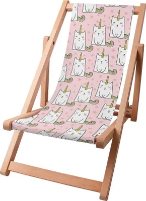 A wooden beach chair with a pink fabric seat featuring a repeating pattern of cartoon unicorn cats.