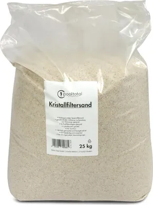 A large, clear plastic bag filled with light-colored sand, with a white label attached to the front.