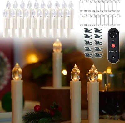 A collection of LED Christmas tree candles with accessories and a remote control, set against a softly lit background.