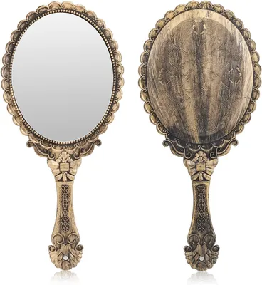 Two views of a vintage-style hand mirror with an ornate handle and decorative pattern on the back.