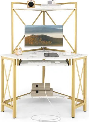 A corner desk with shelves and a monitor.