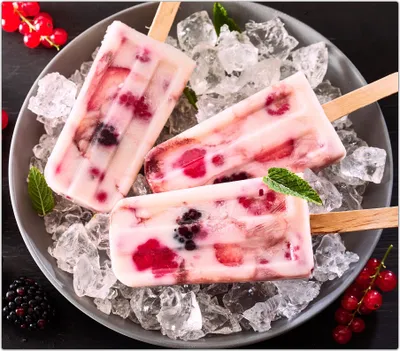 Produktbild von Spritzschutz Herdabdeckplatte Schneidebrett aus Glas Gefrorenes Joghurt am Stiel 1-Teilig (60x52cm)