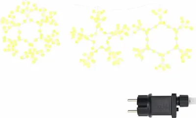 A string of snowflake-shaped lights and a power adapter.