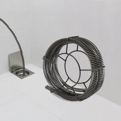 Produktbild von Abflussreiniger - Rohrreinigungsspirale - 22 mm Ø - 7 m Länge - Federdraht - Für Abfluss und Toilette - Gegen hartnäckige Verstopfungen