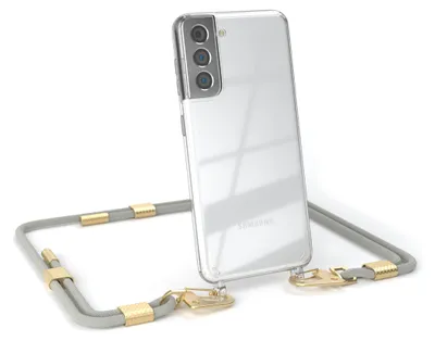 A transparent phone case with a gray and gold lanyard is shown against a white background.