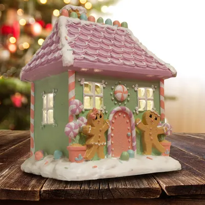 Produktbild von LED Deko Lebkuchenhaus 17x21x13cm Weihnachtshaus lila türkis