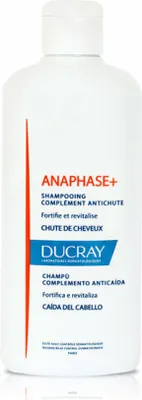 A white bottle of Ducray Anaphase+ shampoo against a white background.