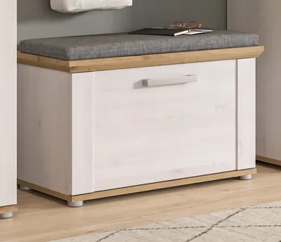 A white and wood storage bench with a gray cushion.