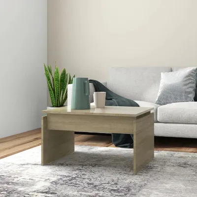 A coffee table with decorative items in a living room setting.