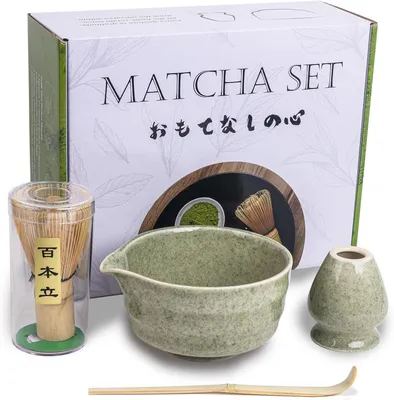 A matcha tea set is displayed on a white background, with the product packaging visible behind it.