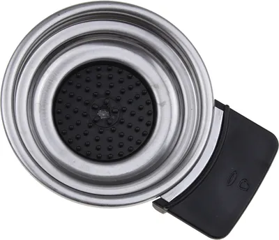 A top-down view of a coffee machine portafilter.