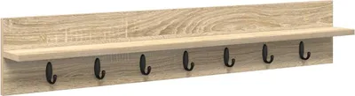 A wall-mounted coat rack with a shelf and hooks.