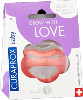 Imagen del producto de Curaprox Baby, chupete de silicona, color coral, talla 1