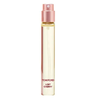A single perfume bottle with a rose gold spray nozzle and cap, against a white background.