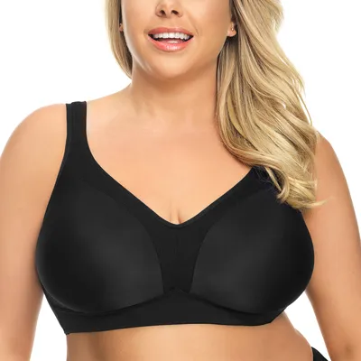 A woman is wearing a black bra.
