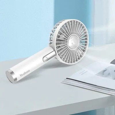 Immagine prodotto di Piccolo ventilatore portatile bianco, verde e rosa