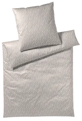 A folded duvet cover and pillowcase set with a geometric pattern.
