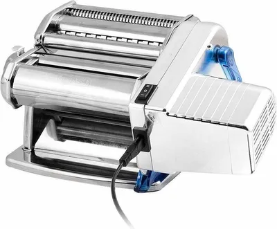 A chrome-plated electric pasta maker with a blue motor attachment and a black power cord plugged in.