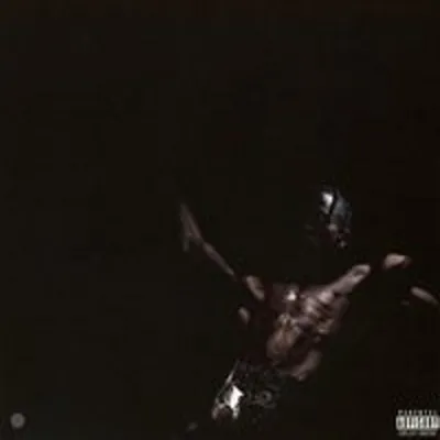 A dark, moody image of a person with their arms outstretched.