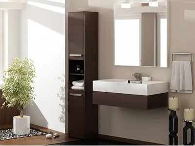 A modern bathroom with a dark wood vanity, white sink, and a tall storage cabinet.