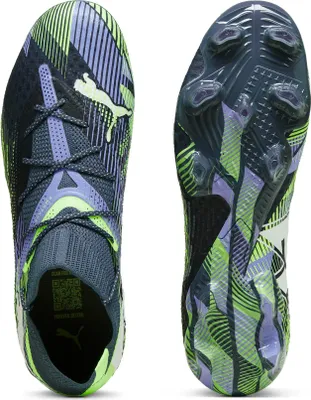 A pair of Puma football boots shown from the top and underneath.