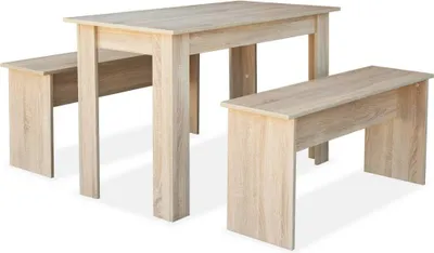 A dining table and two benches made of light-colored wood composite.
