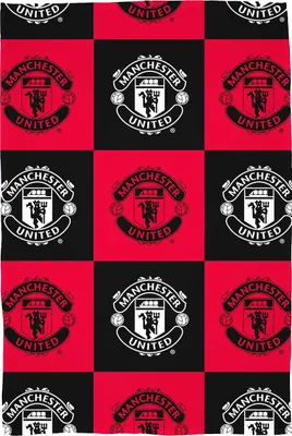 A collage of the Manchester United FC logo repeated on a red and black checkered background.